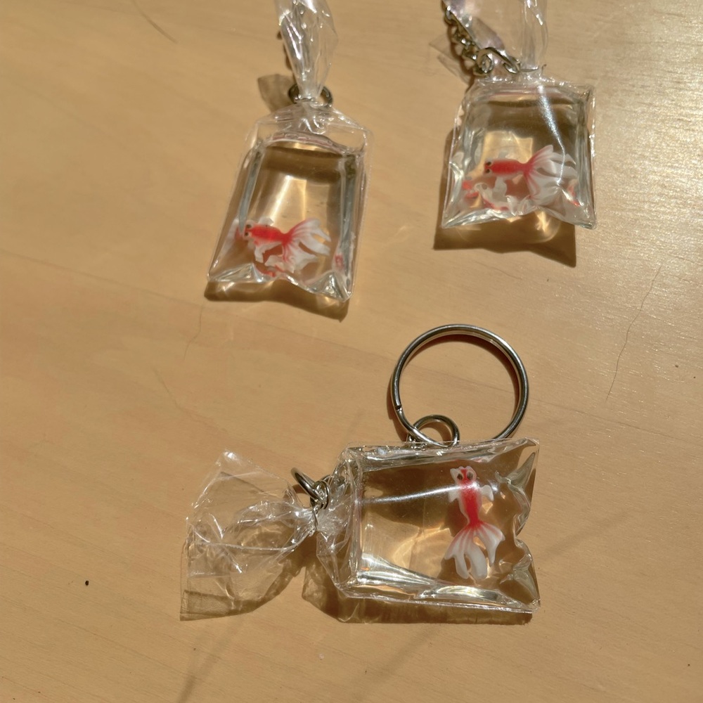 Goldfish in bag earrings and keychain.